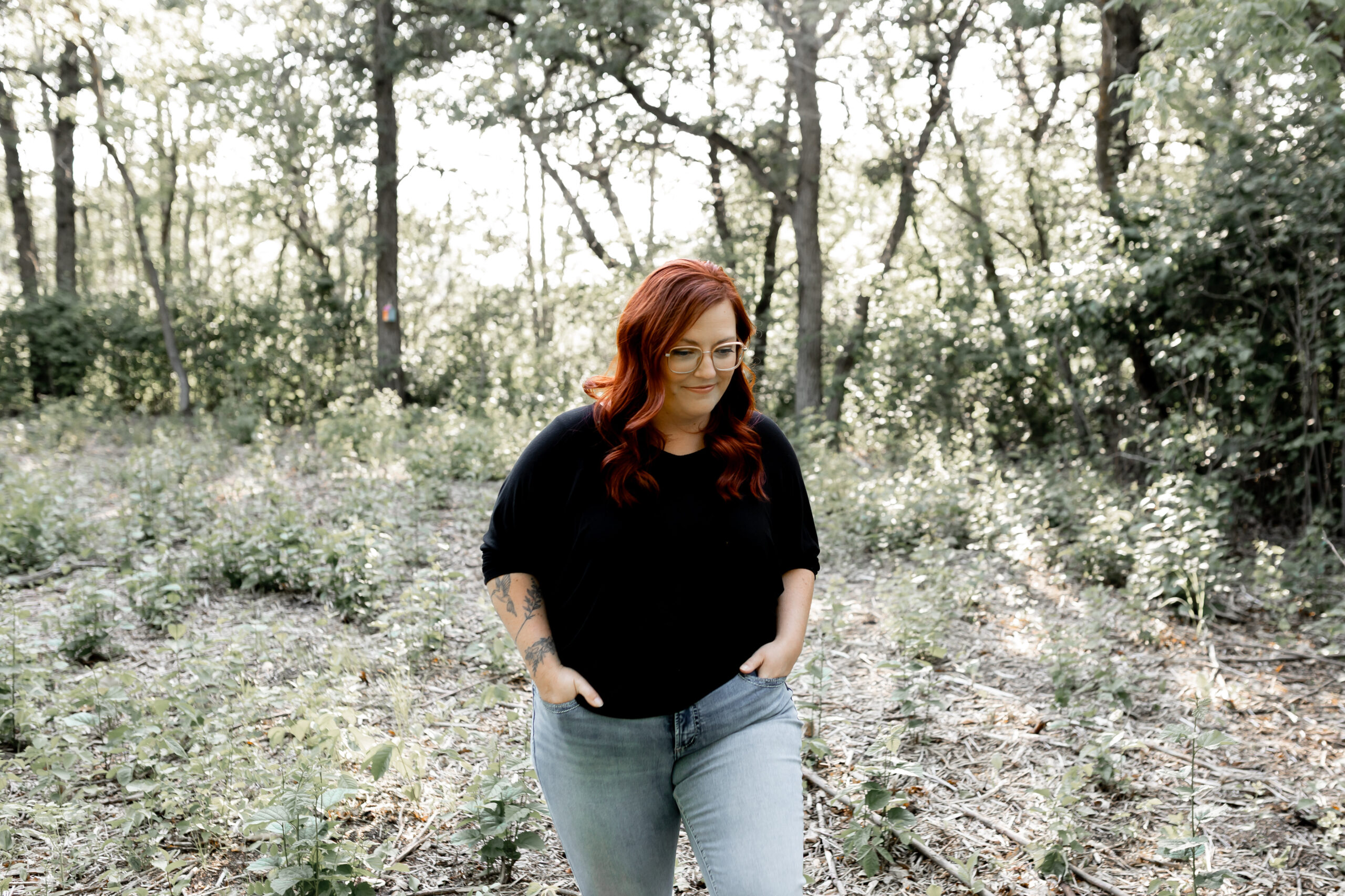 Jess walking in the woods